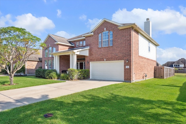 view of front facade with a garage and a front lawn