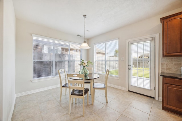 view of tiled dining space