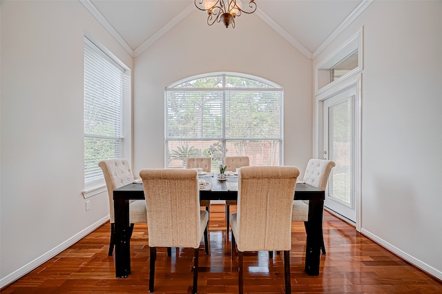 dining space featuring vaulted ceiling, plenty of natural light, and ornamental molding