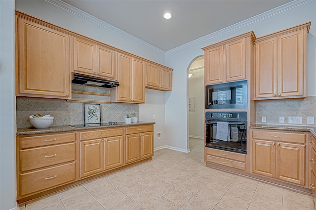 kitchen featuring backsplash, light stone counters, ornamental molding, and black appliances