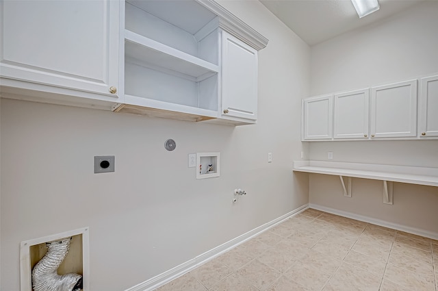 washroom with hookup for a gas dryer, hookup for a washing machine, cabinets, and hookup for an electric dryer