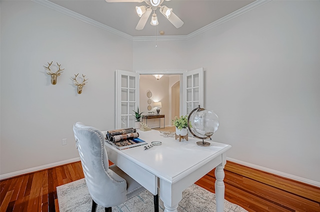 home office featuring french doors, crown molding, and wood-type flooring