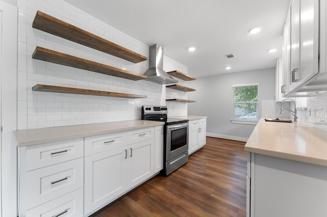 kitchen with sink, electric range, range hood, dark hardwood / wood-style flooring, and white cabinetry