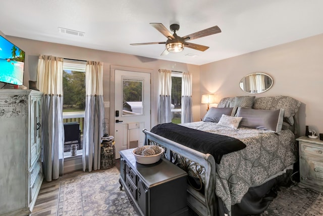 bedroom featuring hardwood / wood-style floors and ceiling fan