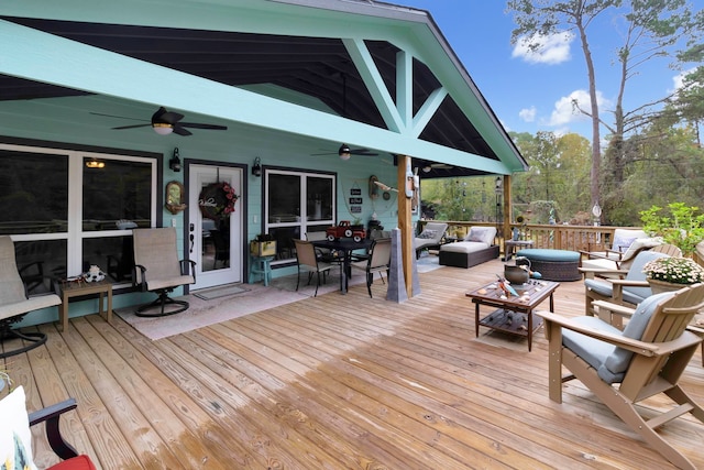 wooden deck featuring ceiling fan and an outdoor hangout area