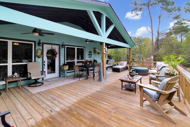 deck featuring ceiling fan and an outdoor hangout area