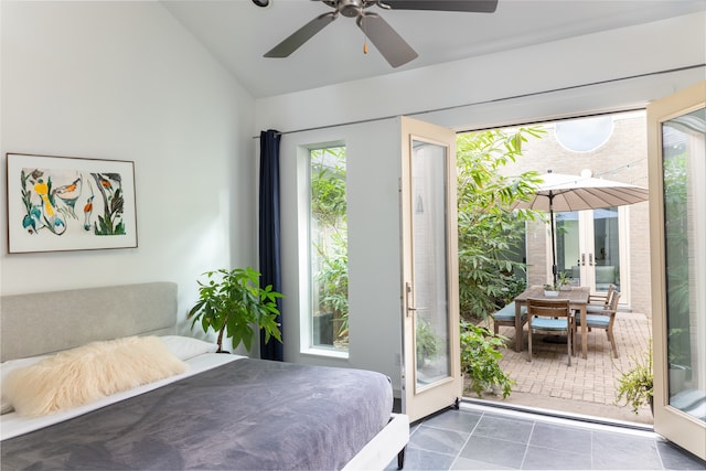 bedroom with french doors, access to outside, ceiling fan, and lofted ceiling