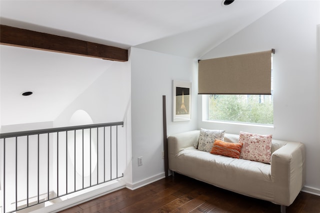 sitting room with vaulted ceiling with beams and dark hardwood / wood-style floors