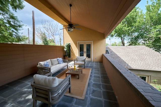 view of patio with an outdoor living space, ceiling fan, and french doors