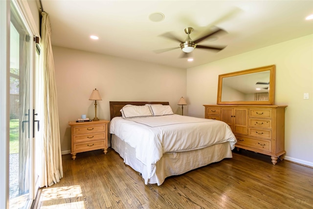 bedroom with access to outside, ceiling fan, and dark wood-type flooring