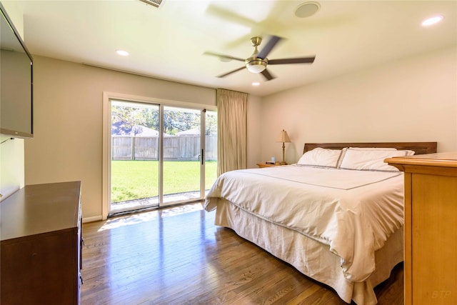 bedroom with hardwood / wood-style floors, access to outside, and ceiling fan