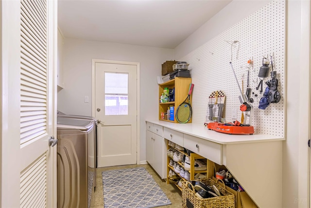 washroom featuring washer / dryer