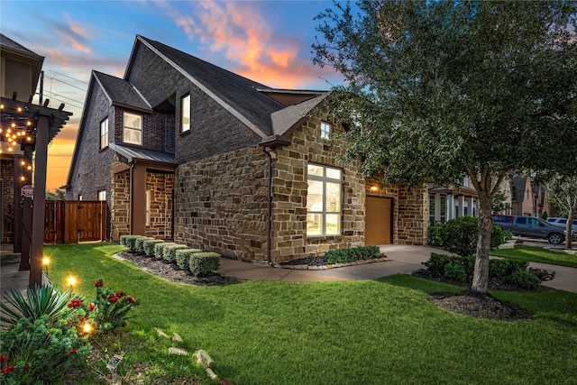 view of front of property with a yard