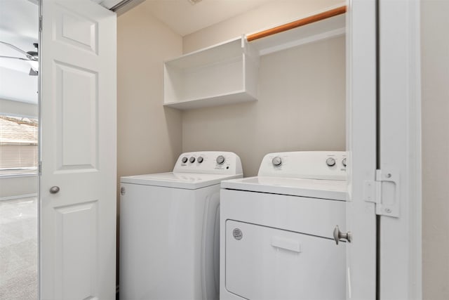 laundry room with independent washer and dryer and ceiling fan