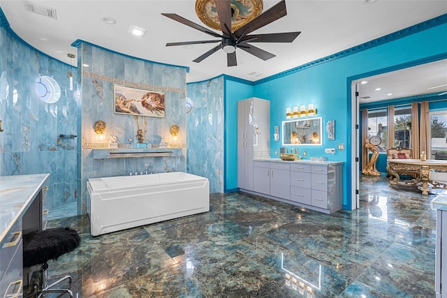 bathroom with a bath, vanity, ceiling fan, and ornamental molding