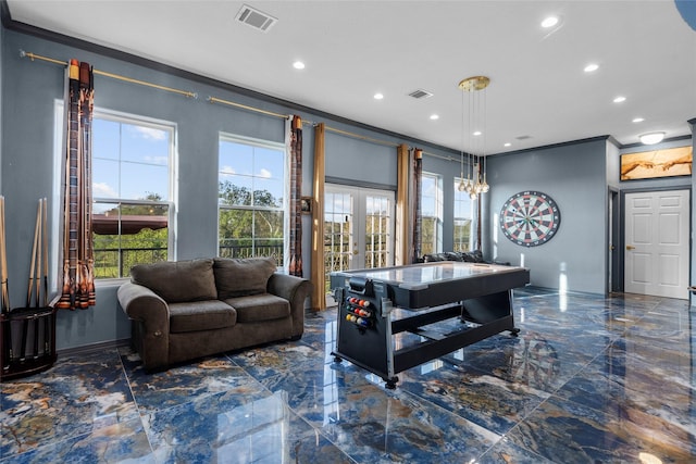 game room featuring french doors and crown molding