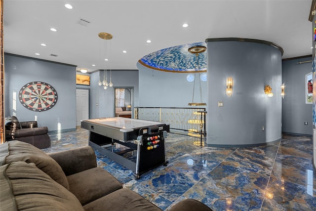 recreation room with an inviting chandelier and ornamental molding