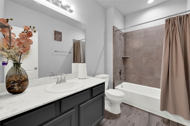 full bathroom with shower / bathtub combination with curtain, vanity, toilet, and wood-type flooring