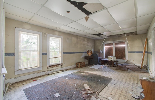 misc room featuring a paneled ceiling