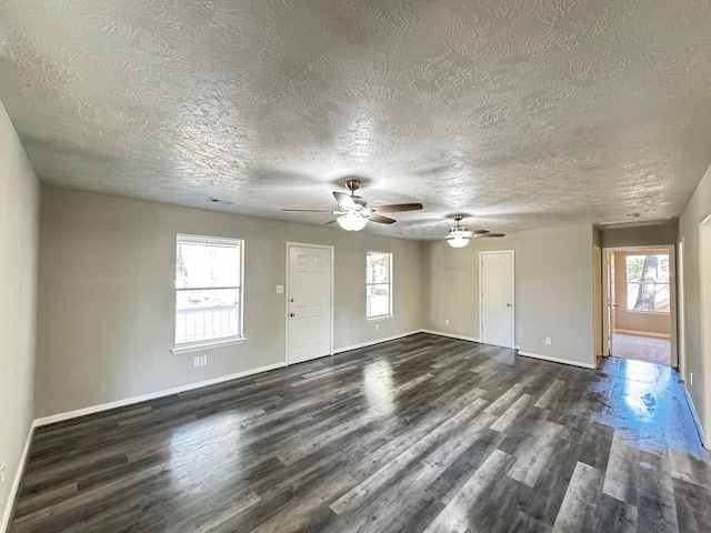 interior space with a textured ceiling and a wealth of natural light