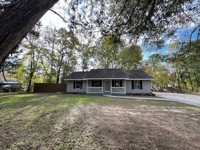 ranch-style home featuring a porch