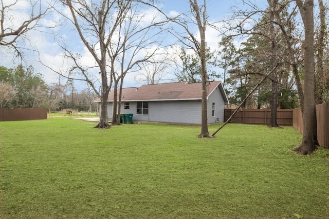 view of yard with fence