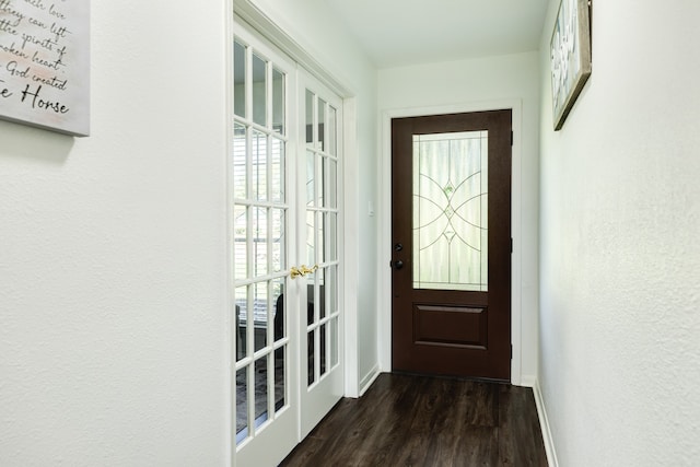 entryway with dark wood-type flooring