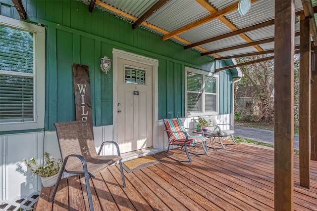 wooden terrace featuring a porch