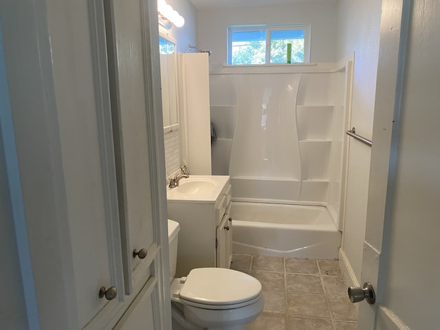 full bathroom featuring tile patterned flooring, vanity, toilet, and tub / shower combination