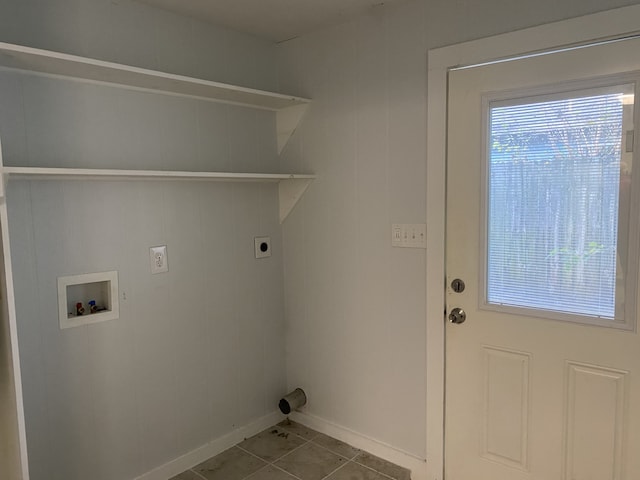 clothes washing area with hookup for an electric dryer, tile patterned flooring, and hookup for a washing machine