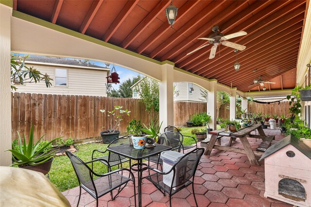 view of patio featuring ceiling fan