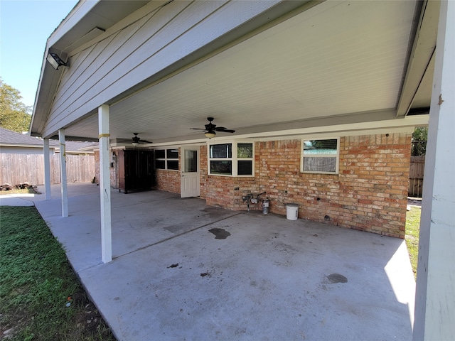 view of patio featuring ceiling fan