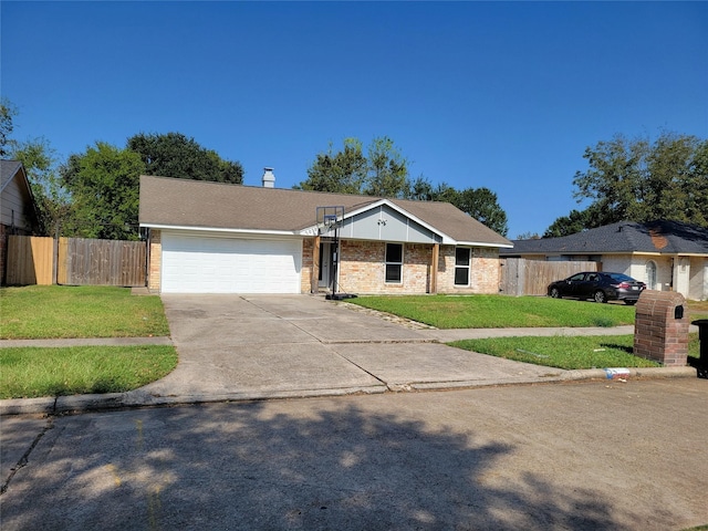 ranch-style house with a front yard and a garage