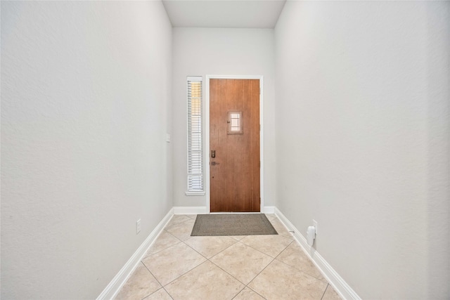 entryway featuring light tile patterned floors