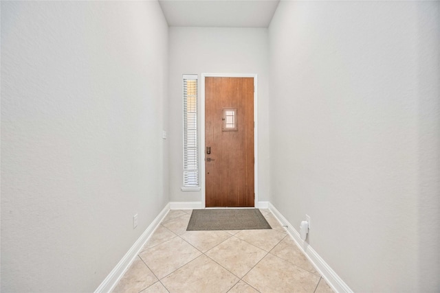 foyer entrance featuring light tile patterned floors