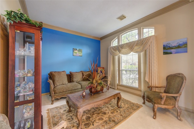 carpeted living room with ornamental molding