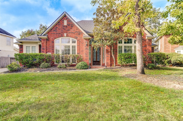 view of front of home with a front lawn