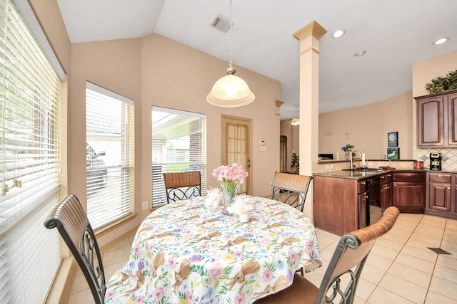 dining area with recessed lighting, light tile patterned flooring, visible vents, and vaulted ceiling