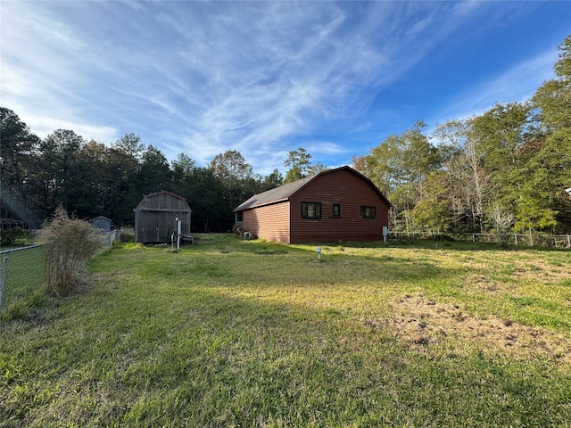 view of yard with a storage shed