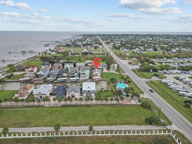 bird's eye view with a water view