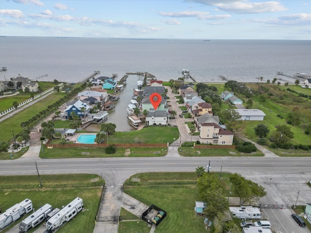 birds eye view of property featuring a water view