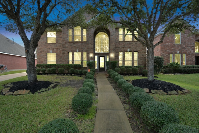 view of front of home with a front lawn