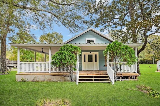 view of front facade featuring a front yard and a porch