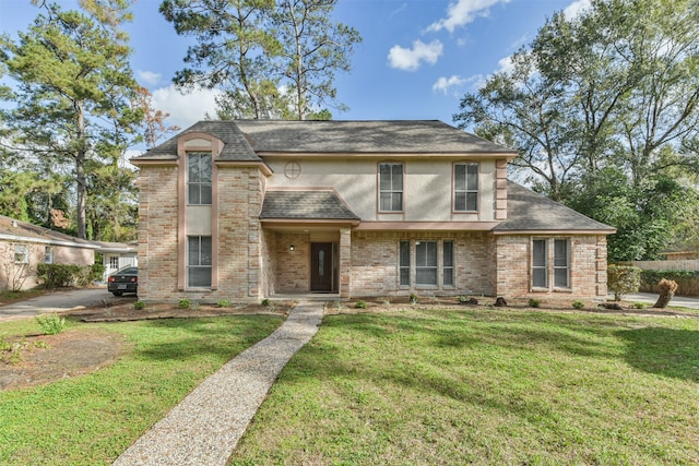 view of front facade with a front yard