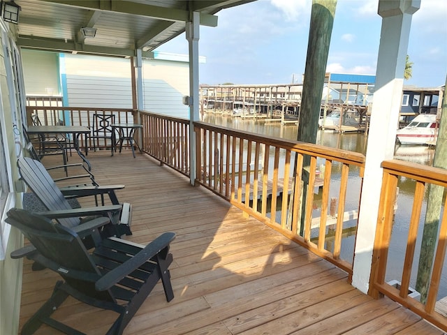 deck featuring a water view