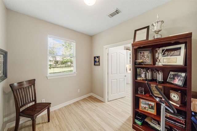 living area featuring light hardwood / wood-style flooring