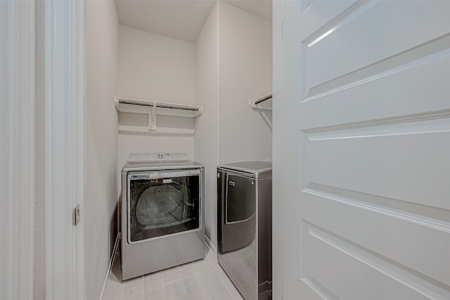 laundry area featuring washing machine and dryer