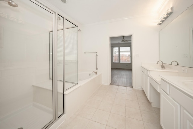 bathroom featuring tile patterned flooring, shower with separate bathtub, vanity, and ceiling fan