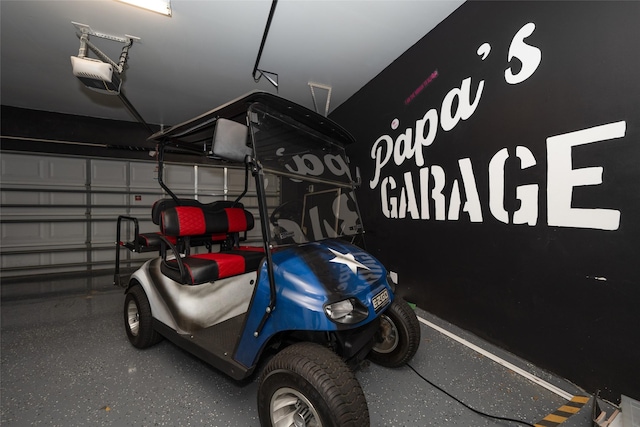 garage featuring a garage door opener