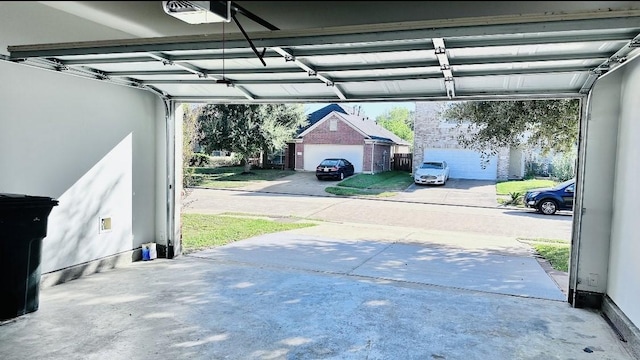 garage featuring a garage door opener